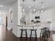 Bright kitchen features granite countertops, stainless steel appliances, and bar stool seating at 4310 Coachwhip Ave, Lancaster, SC 29720