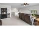 Expansive living room featuring a comfortable sofa, a large entertainment center, and stylish decor for relaxation at 4310 Coachwhip Ave, Lancaster, SC 29720