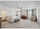 Bright main bedroom with ceiling fan and office desk at 4310 Coachwhip Ave, Lancaster, SC 29720