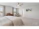 Spacious main bedroom with ceiling fan and large windows at 4310 Coachwhip Ave, Lancaster, SC 29720