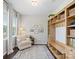 Cozy office with hardwood floors, a comfy chair, natural light, and built-in shelves for storage at 4310 Coachwhip Ave, Lancaster, SC 29720
