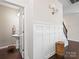 Hallway powder room with hardwood floors and pedestal sink at 4310 Coachwhip Ave, Lancaster, SC 29720