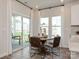 Bright dining area with large windows and sliding glass doors leading to outdoor space at 438 Bent Burr Crk, York, SC 29745