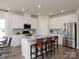 Contemporary kitchen featuring stainless steel appliances, a spacious island, and ample cabinet space at 438 Bent Burr Crk, York, SC 29745