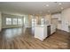 Spacious living room and kitchen area with an island, stainless steel appliances, and natural light at 450 Bent Burr Crk, York, SC 29745