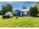 Attractive single-story home boasts a lush green lawn and mature trees at 455 Wood Ave, Kannapolis, NC 28083