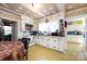 Kitchen featuring a stove, oven, white cabinetry, and a checkered-patterned floor at 455 Wood Ave, Kannapolis, NC 28083