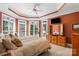 Spacious main bedroom boasts a bay window, decorative stained glass, and an ensuite at 4740 Myers Ln, Harrisburg, NC 28075