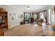 Home office features a bay window, desk, and bookshelf in a well-lit space at 4740 Myers Ln, Harrisburg, NC 28075