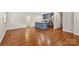Spacious living room with hardwood floors and an adjacent kitchen area at 4906 Charleston Dr, Charlotte, NC 28212
