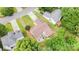 This house has a patio, a well-maintained lawn, and is surrounded by mature trees at 5843 Timber Falls Nw Pl, Concord, NC 28027