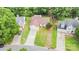 Beautiful single-story home with a long driveway and charming curb appeal, surrounded by mature trees at 5843 Timber Falls Nw Pl, Concord, NC 28027