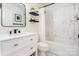 Updated bathroom features a white vanity and stylish glass-enclosed shower at 5843 Timber Falls Nw Pl, Concord, NC 28027