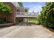 Back exterior view of a home with a spacious deck and ample parking underneath at 81 21St Nw Ave, Hickory, NC 28601