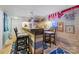 Basement bar area with wood details, a neon sign, ample seating and storage for entertaining at 81 21St Nw Ave, Hickory, NC 28601