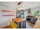 Charming kitchen with stainless steel appliances, island with seating, and unique lighting fixture at 81 21St Nw Ave, Hickory, NC 28601