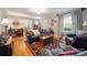 Cozy living room with hardwood floors, a large rug, and comfortable seating, creating an inviting atmosphere at 81 21St Nw Ave, Hickory, NC 28601