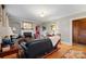 Inviting living room with fireplace, hardwood floors, and neutral paint, offering a cozy and serene retreat at 81 21St Nw Ave, Hickory, NC 28601
