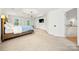 Light-filled bedroom with large bed, ceiling fan, and good natural light at 8500 Headford Rd, Charlotte, NC 28277