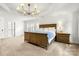 Bright bedroom featuring a trey ceiling, ceiling fan and ample space at 8500 Headford Rd, Charlotte, NC 28277