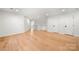 Large bonus room featuring hardwood floors and two entry doors at 8500 Headford Rd, Charlotte, NC 28277