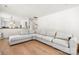 Spacious living area showcasing a large comfortable sectional sofa and hardwood flooring at 8500 Headford Rd, Charlotte, NC 28277