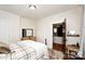 Comfortable bedroom featuring hardwood floors, light walls, and a well-lit entrance at 101 Sunset Dr, Stanley, NC 28164