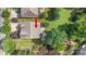 A home with a backyard, green grass, and mature trees creating a serene setting at 10105 Community House Rd, Charlotte, NC 28277