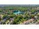 Beautiful aerial view of a luxurious neighborhood with pond and beautiful houses surrounded by lush green trees at 10105 Community House Rd, Charlotte, NC 28277