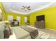 Bright main bedroom with ample natural light, a tray ceiling, and a sleek entertainment center at 10105 Community House Rd, Charlotte, NC 28277