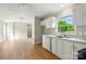Bright kitchen featuring white cabinets, countertops, and modern appliances at 1016 S D Ave, Maiden, NC 28650