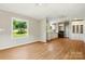 Open-concept kitchen with ample white cabinetry and modern appliances at 1016 S D Ave, Maiden, NC 28650
