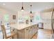 Bright kitchen featuring a large island, stainless steel appliances, and ample cabinet space at 1062 Willow Ridge Ln, Fort Mill, SC 29707