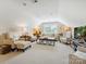 Spacious living room features vaulted ceilings, comfortable seating, and lots of natural light from bright windows at 1226 Restoration Dr, Waxhaw, NC 28173