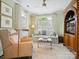 Cozy living room with comfortable seating, natural light, and a classic aesthetic, perfect for relaxing at 1226 Restoration Dr, Waxhaw, NC 28173