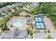 Aerial view of community amenities, including a pool, tennis courts, and a recreation area at 12910 Meetinghouse Dr, Cornelius, NC 28031