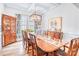 Elegant dining room boasting hardwood floors, a large window, and stylish decor for formal gatherings at 12910 Meetinghouse Dr, Cornelius, NC 28031