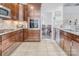 Modern kitchen features stainless steel appliances, granite countertops, and ample cabinet space at 12910 Meetinghouse Dr, Cornelius, NC 28031