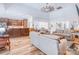 Spacious living room showcasing an open layout, hardwood floors, and plenty of natural light at 12910 Meetinghouse Dr, Cornelius, NC 28031