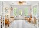 Cozy sunroom featuring neutral furniture and lots of natural light at 12910 Meetinghouse Dr, Cornelius, NC 28031