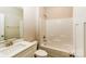 Bathroom featuring a shower-tub combo and a white vanity with a marble countertop at 153 Ole Eastpointe Dr, York, SC 29745