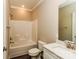 Bathroom featuring a shower-tub combo and a white vanity with a marble countertop at 153 Ole Eastpointe Dr, York, SC 29745