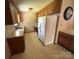 Functional kitchen featuring older appliances, cabinets, and light countertops at 1616 Lazenby St # 17, Newton, NC 28658