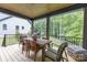 Relaxing porch features an outdoor dining set with nature views perfect for backyard relaxation at 18238 Youngblood N Rd, Charlotte, NC 28278