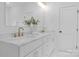 Bright and airy bathroom with dual sinks and marble countertops at 18238 Youngblood N Rd, Charlotte, NC 28278