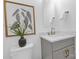 Bathroom with marble vanity top and plant decoration at 18238 Youngblood N Rd, Charlotte, NC 28278