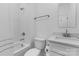 Bright bathroom with white subway tiles, tub-shower, and modern vanity at 18238 Youngblood N Rd, Charlotte, NC 28278