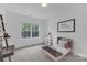 bedroom with a window and decorative 'Wild Thing' framed picture at 18238 Youngblood N Rd, Charlotte, NC 28278