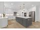 Well-appointed kitchen featuring a large island, stainless steel appliances, and ample cabinet space at 18238 Youngblood N Rd, Charlotte, NC 28278