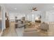 Spacious living room featuring hardwood floors, a neutral color palette, and an open layout into the kitchen at 18238 Youngblood N Rd, Charlotte, NC 28278